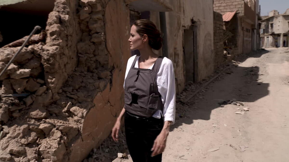 Actress Angelina Jolie walked around West Mosul to see the devastation, less than one year after the city was liberated from ISIS. (almasdarnews.com)