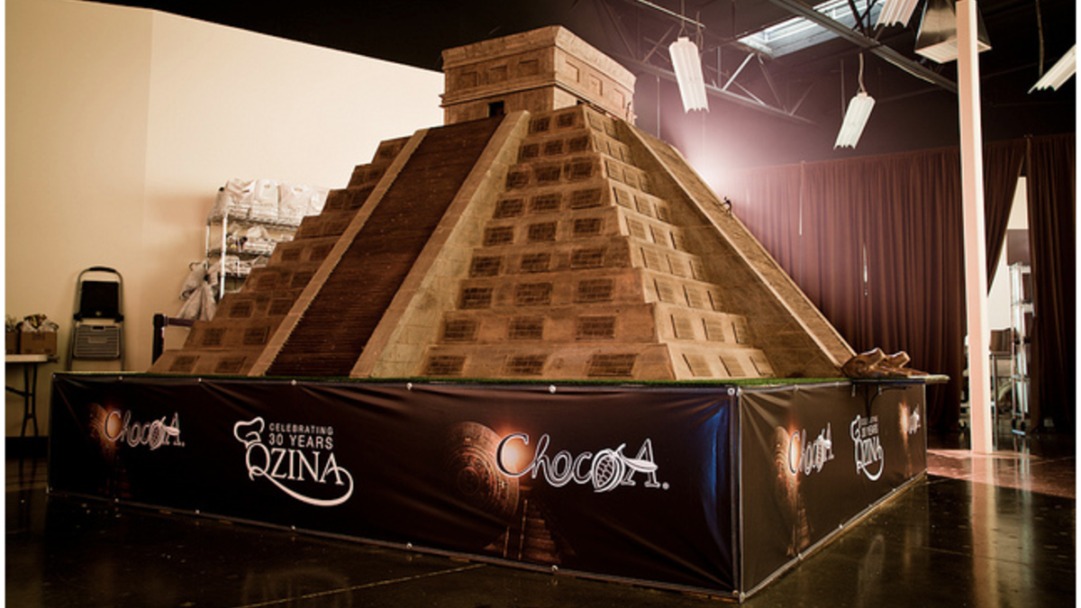 A 18,000 pound chocolate structure – modeled after the Mayan temples.  This required an entire team of builders and pastry experts. (mrkate.com)