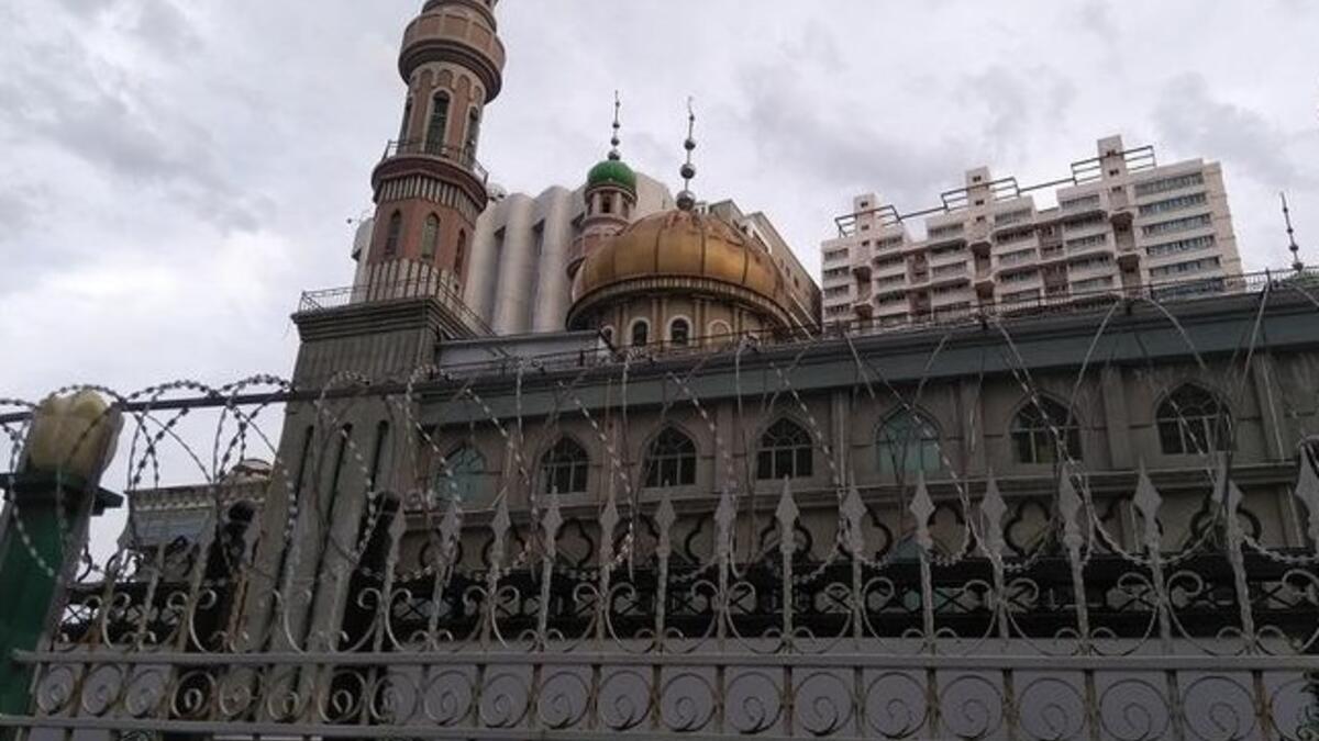 The Yan'anlu Mosque in Urumqi, Xinjiang closed off by razor wire, unable to be accessed by worshipers or tourists. Courtesy of Dr. Joanne Smith Finley