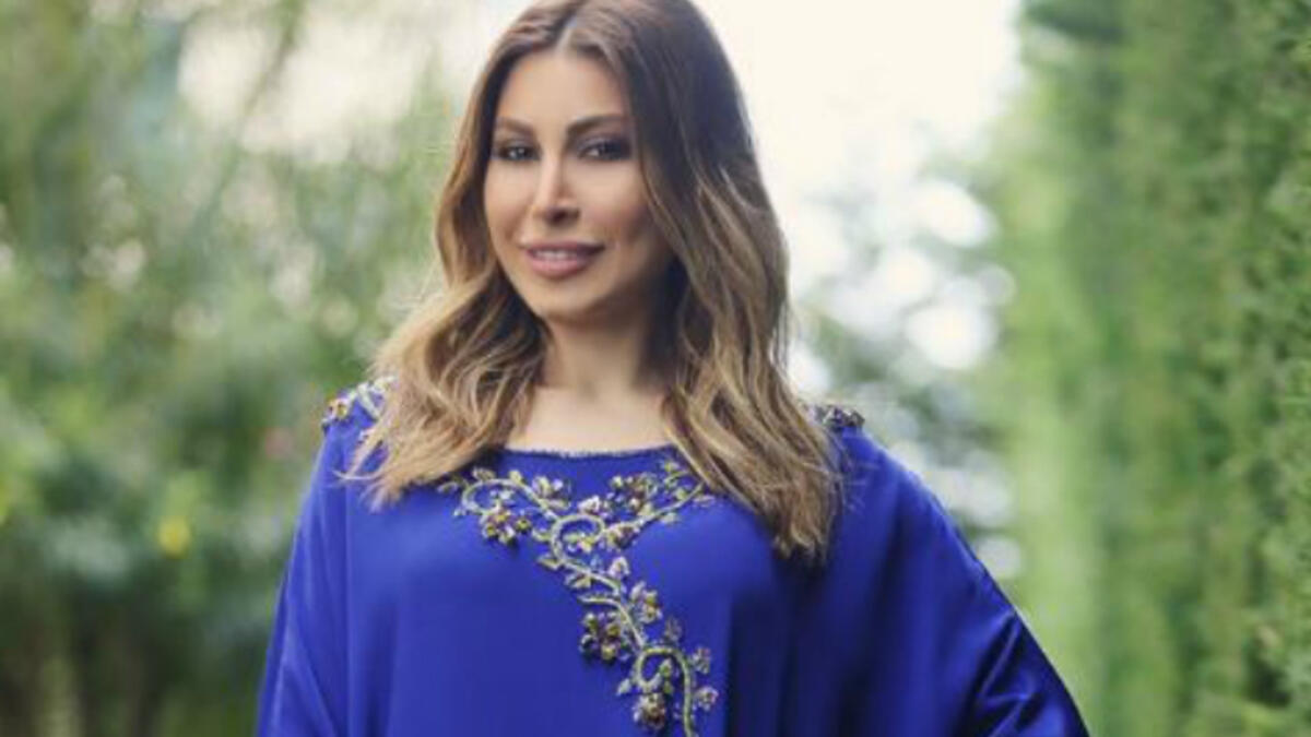 Yara posted a picture in a blue Abaya to send her wishes to her followers during the holy month