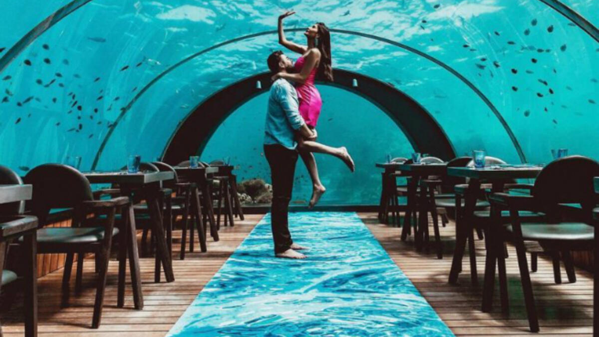 Taken in 5.8 Undersea, the deepest undersea restaurant while vacationing in sunny Maldives. Alice and Ali hit