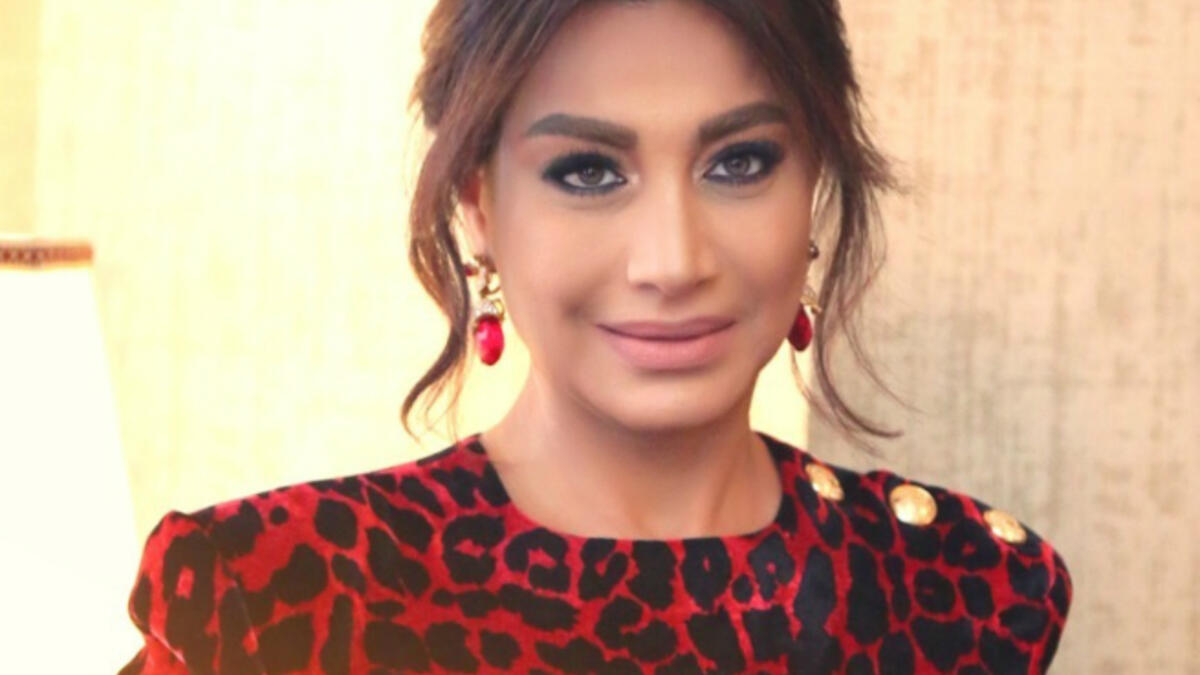 TV host Basma Wahba wore the hijab for a while during her illness then went back to the screen before being