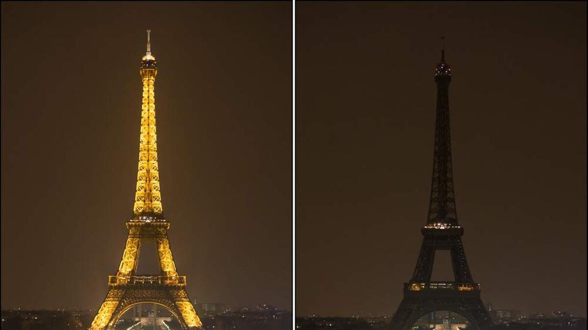 خيم الظلام على برج إيفل في وقت متأخر السبت بعدما أطفأت باريس أنوار أشهر معالمها السياحية احتفالًا بساعة الأرض هذا العام.