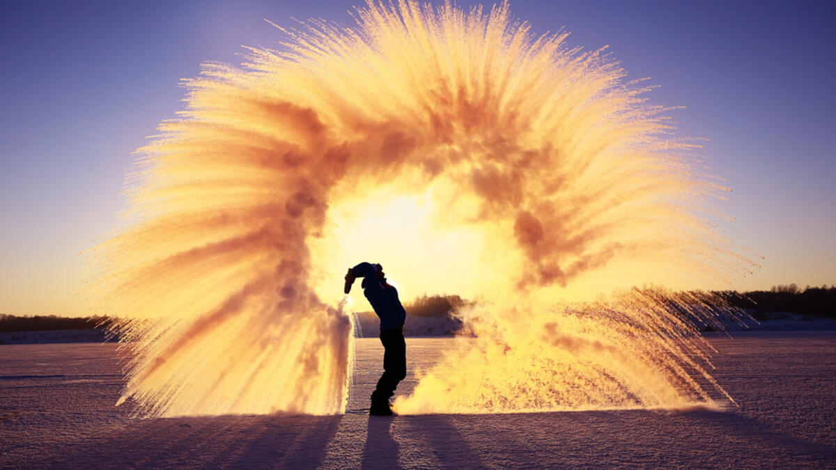 Frost effect hot water freezes man pours boiling water. (Shutterstock/ File Photo)