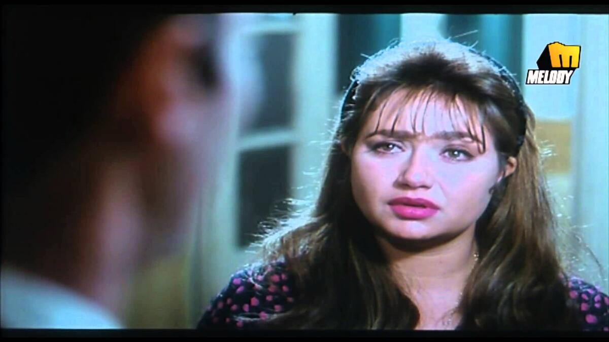 قَيلة الفنان محمود حميدة والفنانة ليلى علوى فى فيلم "إنذار بالطاعة".
