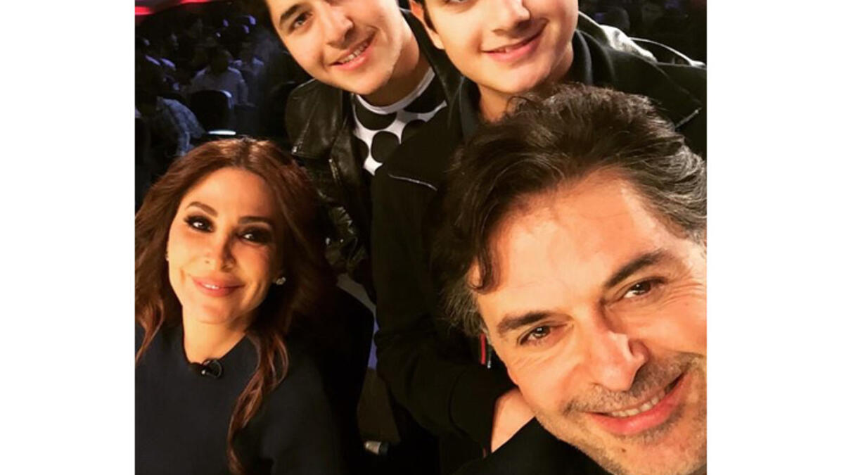 Cutest selfie ever? Ragheb Alama takes a picture with fellow X Factor judge Elissa, and his two sons Khaled and Louai! (Image: Facebook)