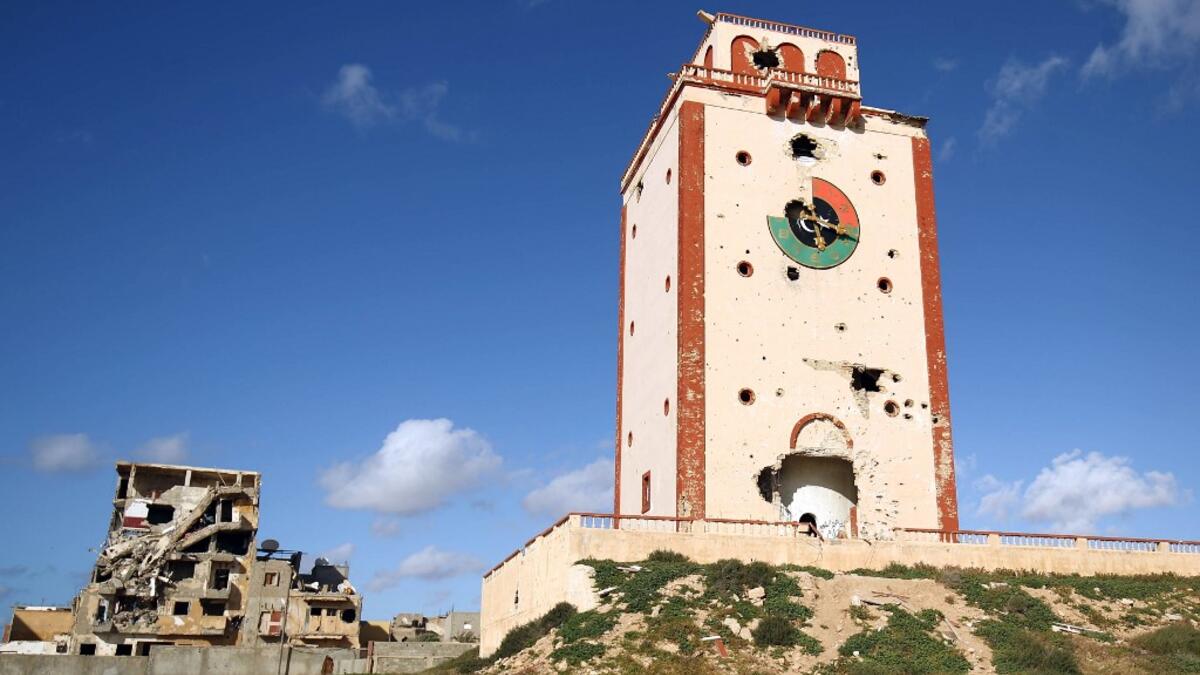 Buildings, heavily damaged from previous clashes, are pictured in Libya's eastern city of Benghazi on April 8, 2019. Abdullah DOMA / AFP