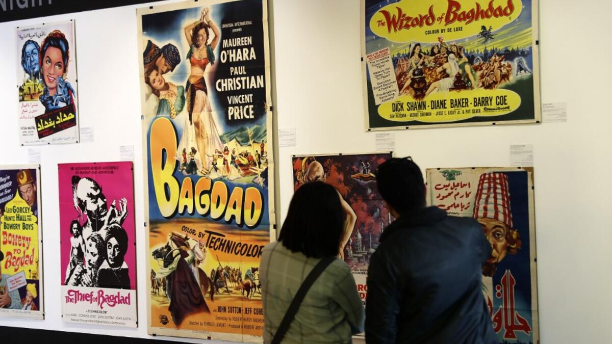 In a Beirut cultural centre, Lebanese film buff Abboudi Abu Jawdeh is exhibiting vintage film posters from his collection that show off a lost art, but also offer insight into decades of Western cliches of the Arab world. JOSEPH EID / AFP