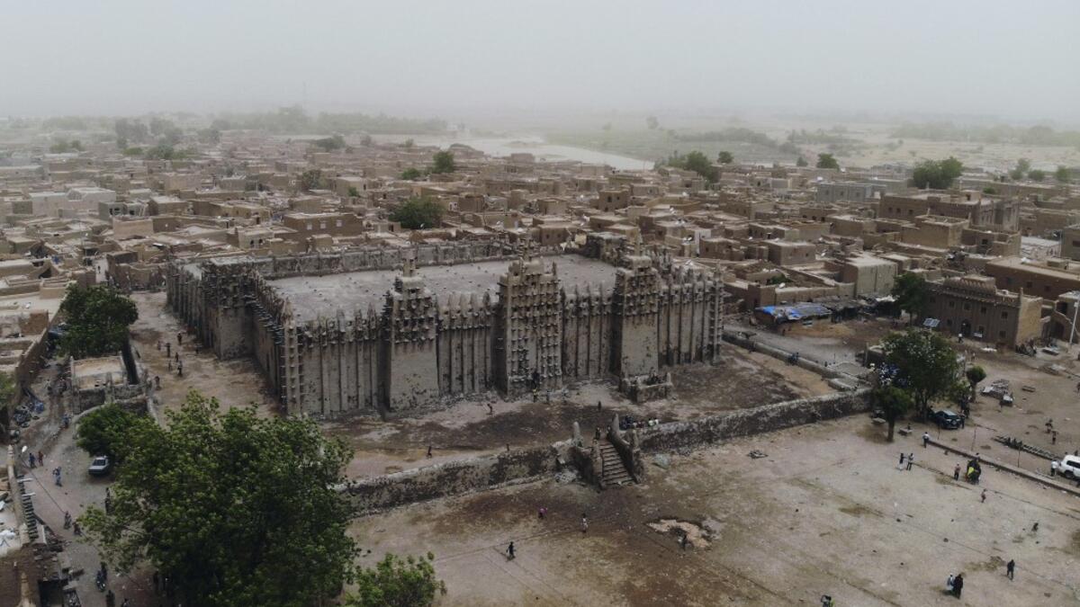 A picture shows the Great Mosque of Djenne in central Mali during its annual rendering ceremony  MICHELE CATTANI / AFP