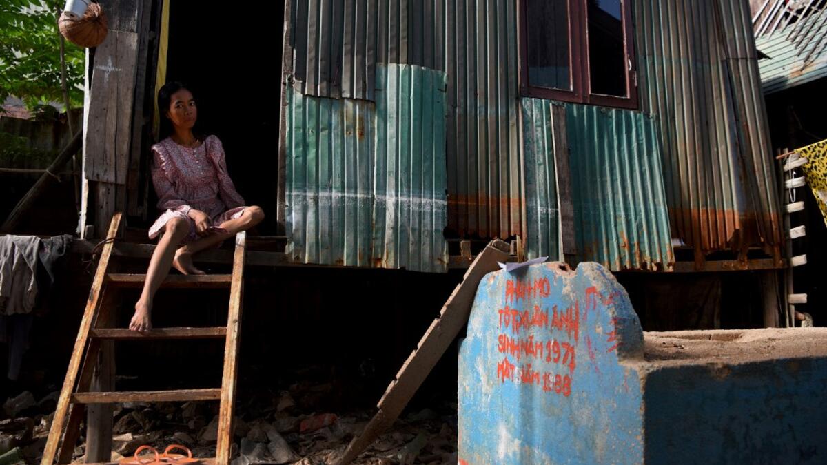 Graveyards may traditionally be the eternal resting place for the dead, but one cemetery in Phnom Penh is increasingly becoming a place to stay for the living as land disputes plague the nation’s poor.  TANG CHHIN Sothy / AFP