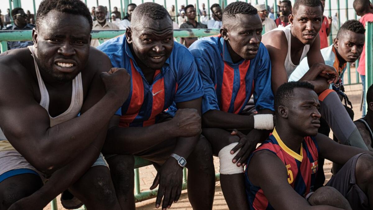 Originating in the Nuba mountains, the sport has become wildly popular country-wide in recent years. The Sudanese Nuba wrestling federation organizes matches every Friday that attract hundreds of people. Yasuyoshi CHIBA / AFP