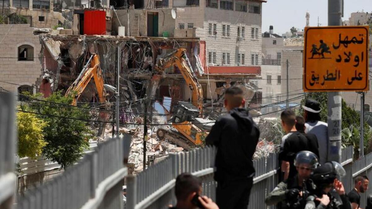 Israeli Forces Kill Veteran Journalist, Demolish Palestinian Homes