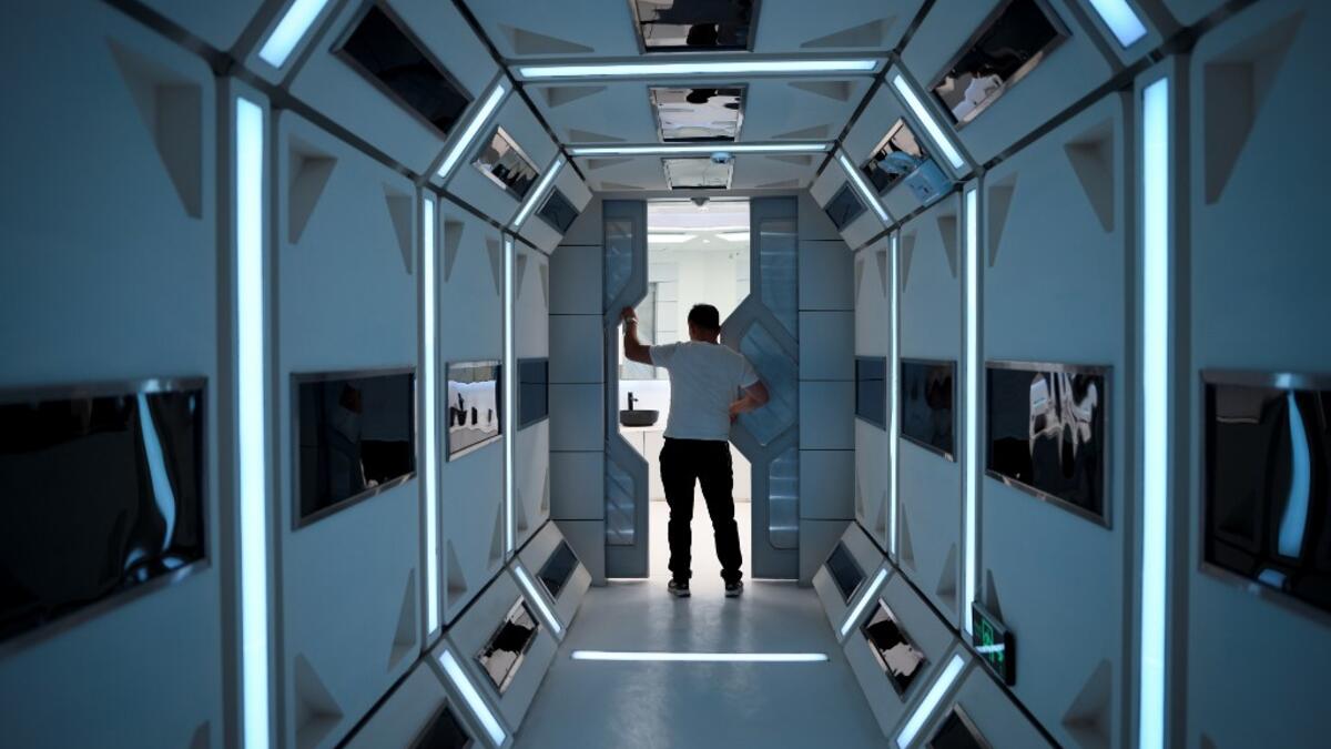 A man visits "Mars Base 1", a C-Space Project, in the Gobi desert, some 40 kilometres from Jinchang in China's northwest Gansu province on April 17, 2019. WANG ZHAO / AFP