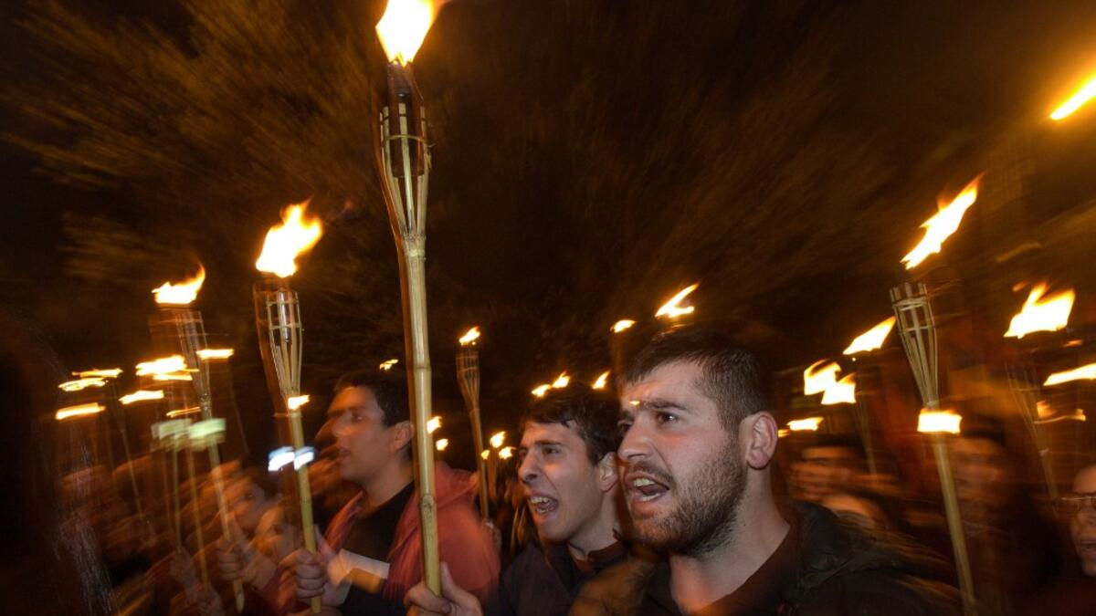 Armenians commemorate on April 24, the 104th anniversary of the killing of 1.5 million by Ottoman forces, as a fierce dispute still rages with Turkey over Ankara's refusal to recognise the mass murder as genocide.  KAREN MINASYAN / AFP