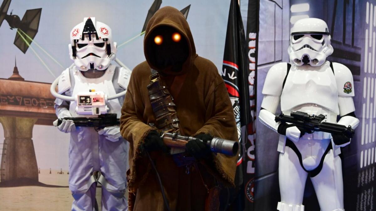 Cosplayers attend the Middle East Film & Comic Con on April 13 , 2019, in Dubai.  GIUSEPPE CACACE / AFP
