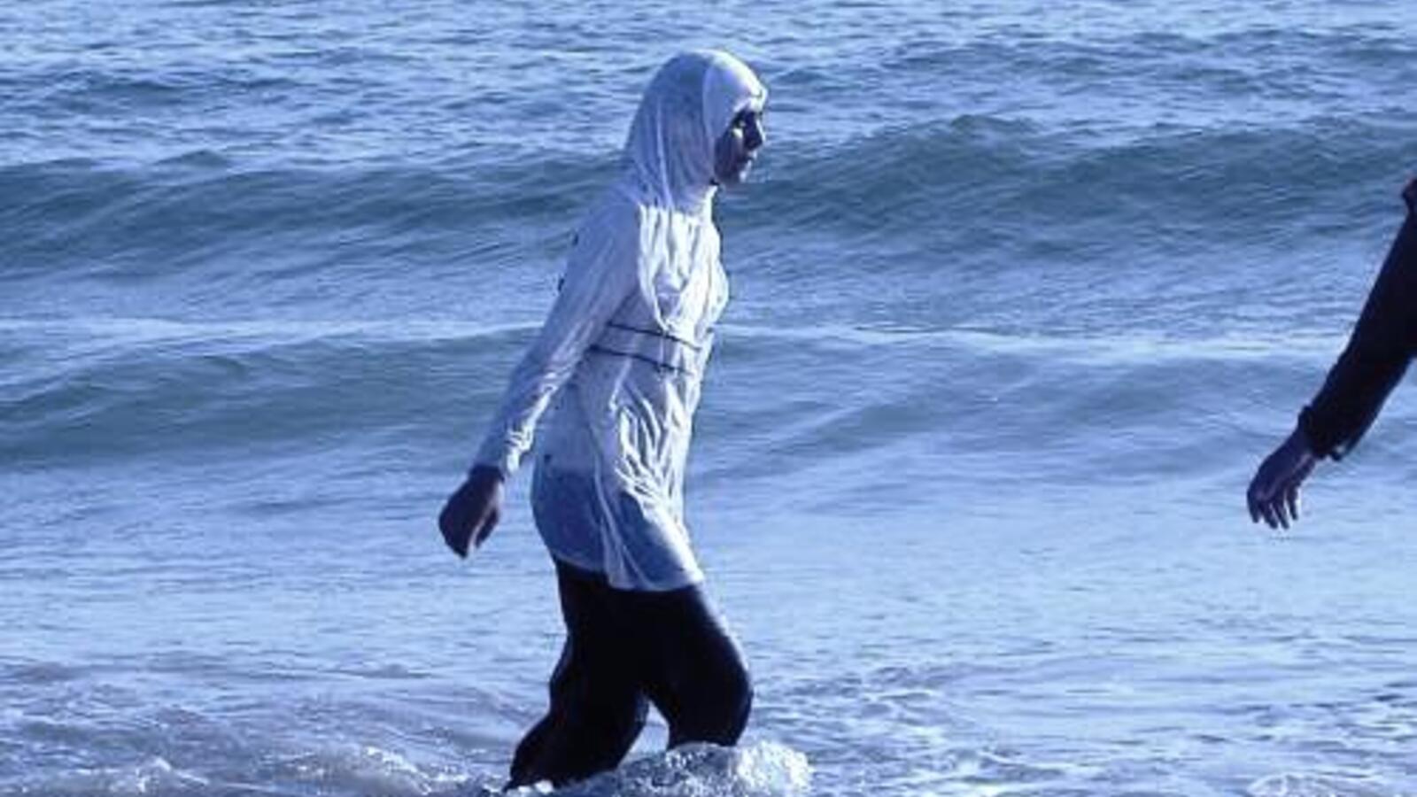 Bikinis and Hijabis contrast on Albanian beach Al Bawaba