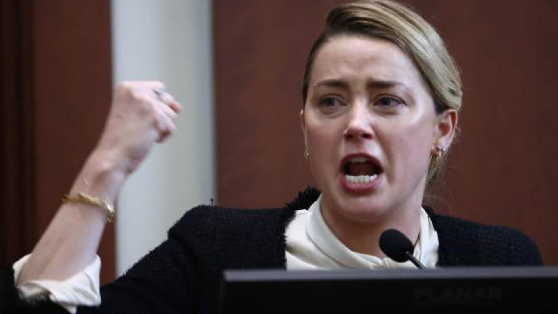 VIDEO: Did Amber Heard Just Sniff Cocaine in Court? Al Bawaba