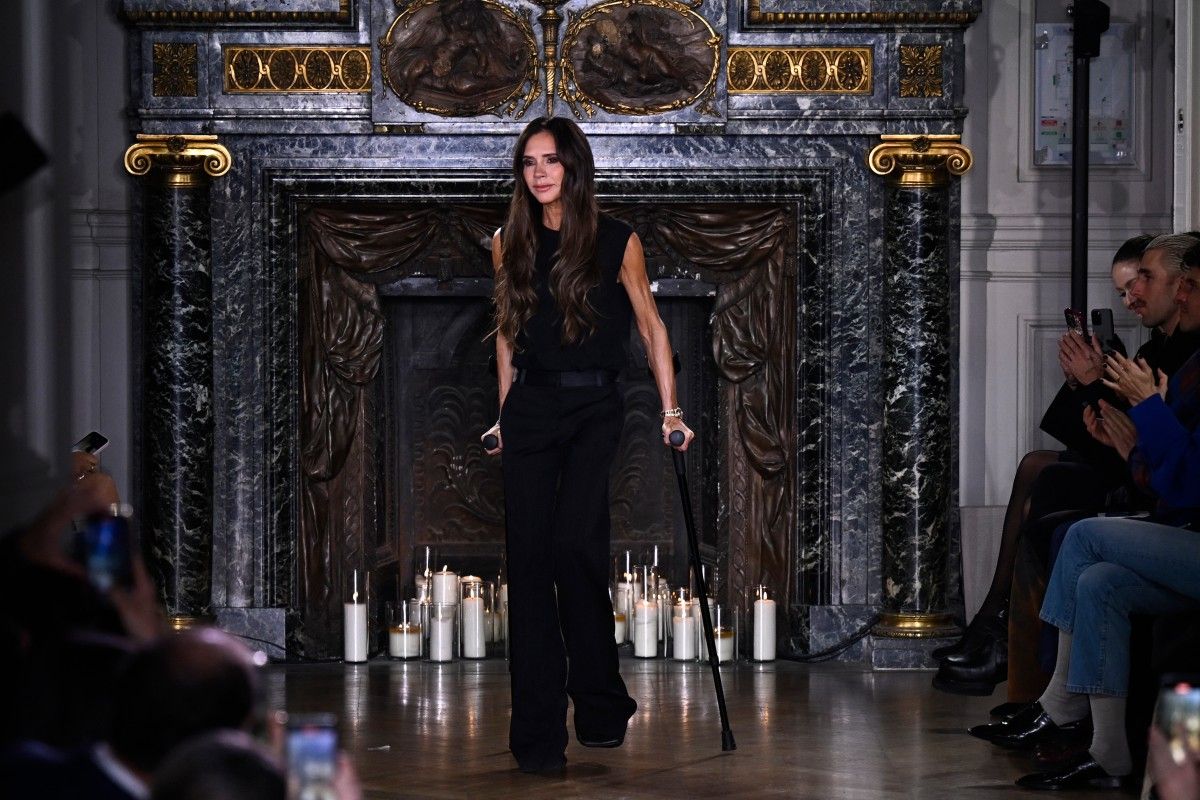 Why Victoria Beckham is stepping out at fashion week with crutches Al