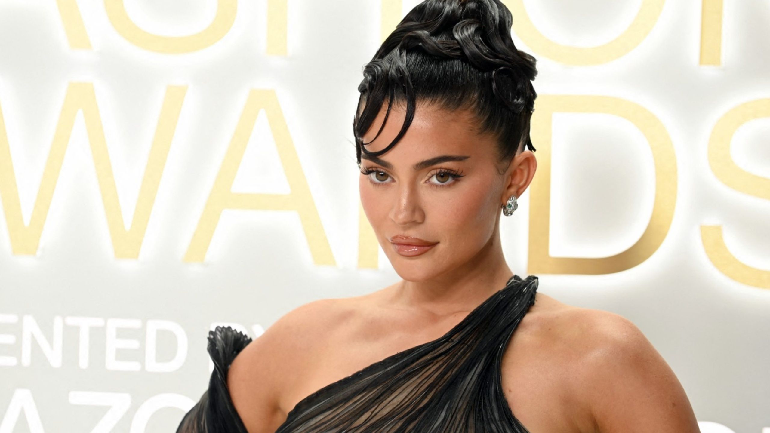 Kylie Jenner shares private island bikini pics as $20M mansion hits