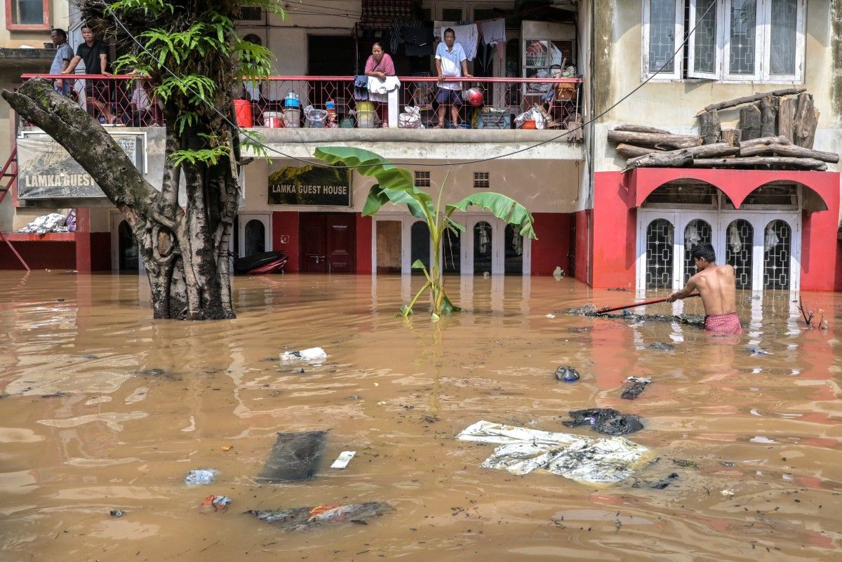 150 dead as unseasonal rains trigger floods and landslides in India and Nepal