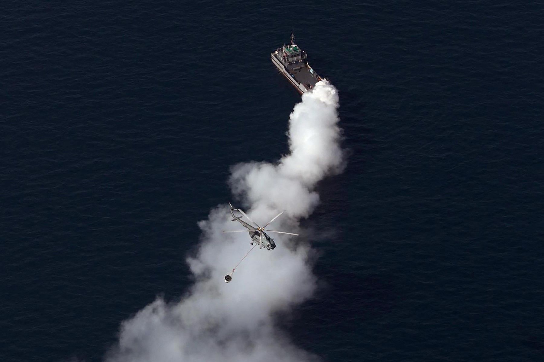 Crew rescued after sanctioned tanker catches fire in suspected attack off Oman