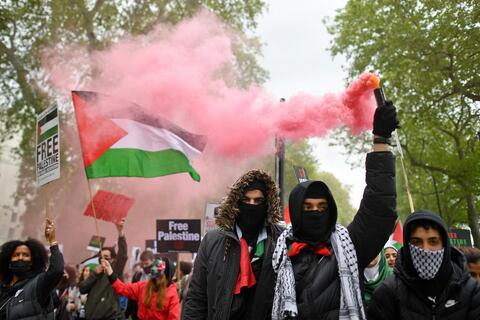 Pro-Palestine Supporters Burn Israeli Flags in London