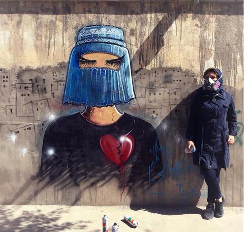 Taliban Militants Blur Women’s Images Out of Street Adverts