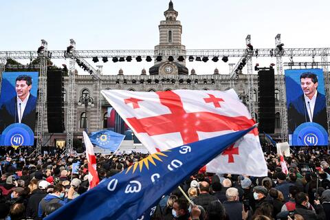 Under pressure, Georgia rescinds 'foreign agents' bill