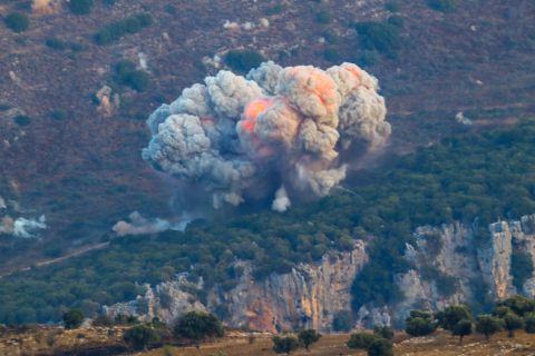 Israel strikes Lebanon, calls civilians to clear Hezbollah sites