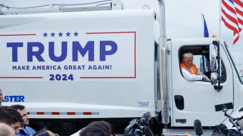 Donald Trump rides garbage truck in honor of Biden and Harris