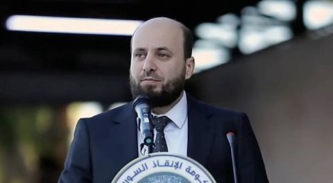 أول رئيس لحكومة انتقالية في سوريا الجديدة.. من هو 