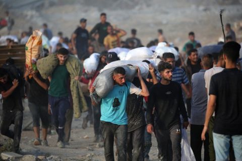 Israeli strikes hit café, charging station in Gaza, killing dozens of civilians