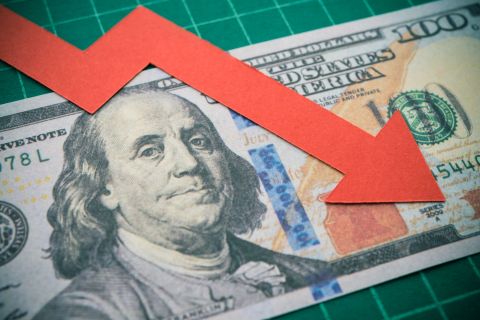 US dollar dips as EM currencies rise